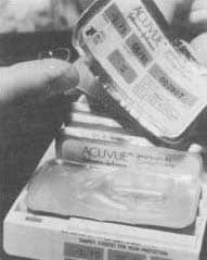 Black-and-white archival photograph showing Acuvue disposable contact lens launch materials.