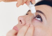 woman-using-eye-drop