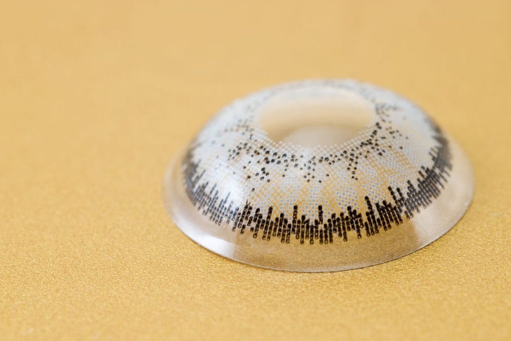 scleral-contact-lens-on-yellow-background