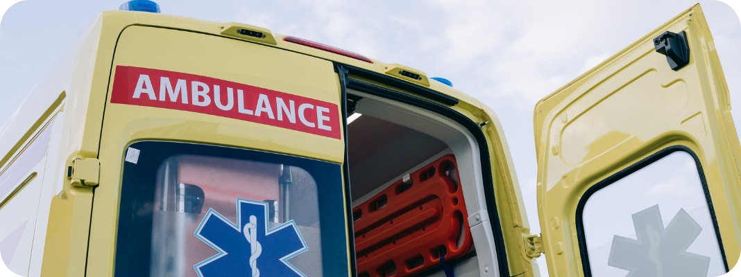 Ambulance with on door open ready to receive emergencies.