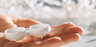 hand-holding-contact-lens-case