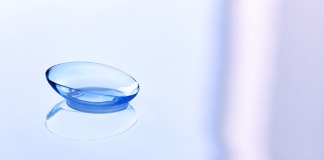 contact-lens-on-light-blue-background