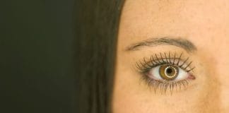 ring-flash-reflected-in-woman-eye-close-up-of-eye